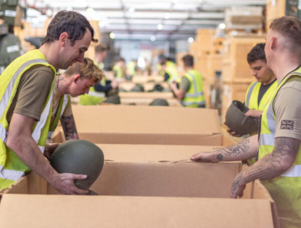 2nd Battalion Royal Anglian Soldiers Drafted in to Pack Military Helmets for Ukraine