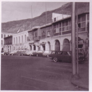 Cars parked outside a building in the city in Aden