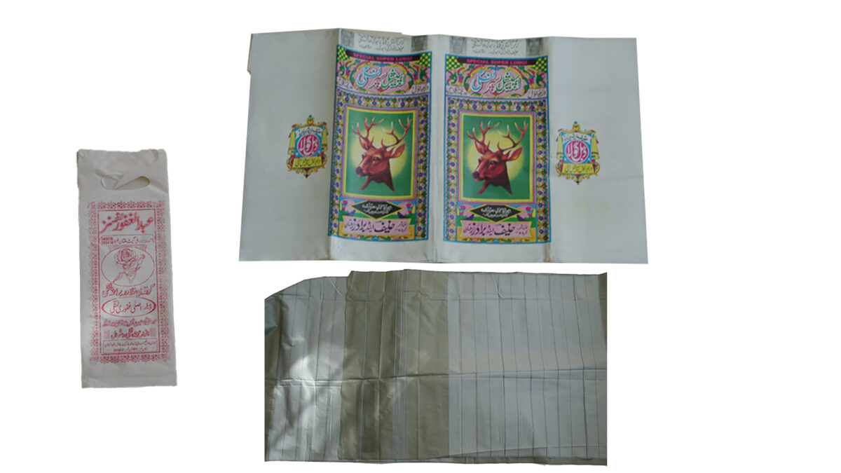 Piece of grey fabric with striped border- a lunghi - traditional dress of Afghanistan males