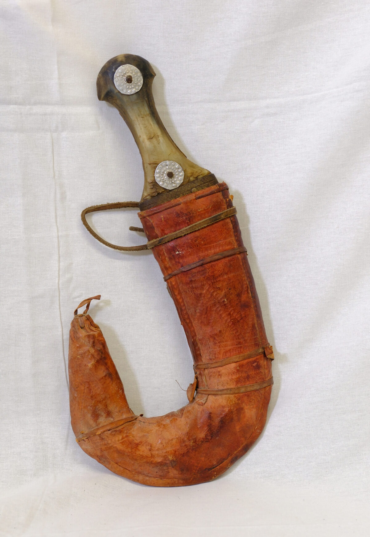 An Arab Dagger in Sheath acquired by David Thorogood while posted to the Aden Protectorate Levies An Arab Dagger in Sheath acquired by David Thorogood while posted to the Aden Protectorate Levies