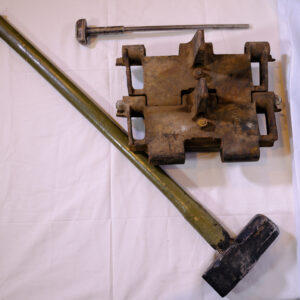Part of tracked vehicle track, circa 1980s and removal tools