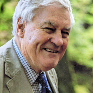 ajor Bernard Herbert Gordon Mills was born on 21st February 1932, and commissioned into the Suffolk Regiment twenty years later, serving with them during the Cyprus Emergency. In December 1957 he, along with two men caught the leader of EOKA in Dhavlos and one of his henchmen red-handed as they were haranguing the people of the village. The following April his patrol raided a coffee shop in the village of Meniko capturing three men as they were attempting to hide. On return to the UK he joined 22 SAS, and later served on secondment to the Sultan’s Armed Forces in Oman until he retired from the Army in 1964. He then became a Contract Officer with the Royalist Army serving on the Yemen border. He worked for Save The Children Fund in Biafra in the early 1970s during the Biafran Civil War, and then for a number of other NGOs in Bangladesh. In 1975 he moved to the Middle East to work for a Merchant Bank as their representative in Oman and Jordan. His employer said of him that he was not sure that he would make a successful banker but was particularly good at lunches. Nevertheless, he remained a significant asset to the Bank remaining with them until 1979. Bernard Mills then returned to England to take a three-year Arabic degree at Cambridge University. On completion of his degree in 1982, he applied to join the UN Relief and Works Agency (UNRWA) and was appointed their officer in charge of South Lebanon. At the time part of South Lebanon was occupied by Israel following the 1982 War. Bernard insisted on living in the occupied area, his local staff were not of high calibre, the rest of his staff lived in Beirut commuting into the occupied zone each day. He visited all the refugee camps in person and would arrive at schools at 0830 to ensure the teaching staff were there at the start of the school day. He very quickly became respected by the Palestinians and feared by those “on the make.” In 1986 he was promoted to Director for Gaza, one of only five in the whole of the Agency. He was in Gaza for the 1st Palestinian refugee Intifada (uprising) and was responsible for bringing a team of International Observers into the Country, to provide independent reports on the atrocities being commit ajor Bernard Herbert Gordon Mills was born on 21st February 1932, and commissioned into the Suffolk Regiment twenty years later, serving with them during the Cyprus Emergency. In December 1957 he, along with two men caught the leader of EOKA in Dhavlos and one of his henchmen red-handed as they were haranguing the people of the village. The following April his patrol raided a coffee shop in the village of Meniko capturing three men as they were attempting to hide. On return to the UK he joined 22 SAS, and later served on secondment to the Sultan’s Armed Forces in Oman until he retired from the Army in 1964. He then became a Contract Officer with the Royalist Army serving on the Yemen border. He worked for Save The Children Fund in Biafra in the early 1970s during the Biafran Civil War, and then for a number of other NGOs in Bangladesh. In 1975 he moved to the Middle East to work for a Merchant Bank as their representative in Oman and Jordan. His employer said of him that he was not sure that he would make a successful banker but was particularly good at lunches. Nevertheless, he remained a significant asset to the Bank remaining with them until 1979. Bernard Mills then returned to England to take a three-year Arabic degree at Cambridge University. On completion of his degree in 1982, he applied to join the UN Relief and Works Agency (UNRWA) and was appointed their officer in charge of South Lebanon. At the time part of South Lebanon was occupied by Israel following the 1982 War. Bernard insisted on living in the occupied area, his local staff were not of high calibre, the rest of his staff lived in Beirut commuting into the occupied zone each day. He visited all the refugee camps in person and would arrive at schools at 0830 to ensure the teaching staff were there at the start of the school day. He very quickly became respected by the Palestinians and feared by those “on the make.” In 1986 he was promoted to Director for Gaza, one of only five in the whole of the Agency. He was in Gaza for the 1st Palestinian refugee Intifada (uprising) and was responsible for bringing a team of International Observers into the Country, to provide independent reports on the atrocities being commit
