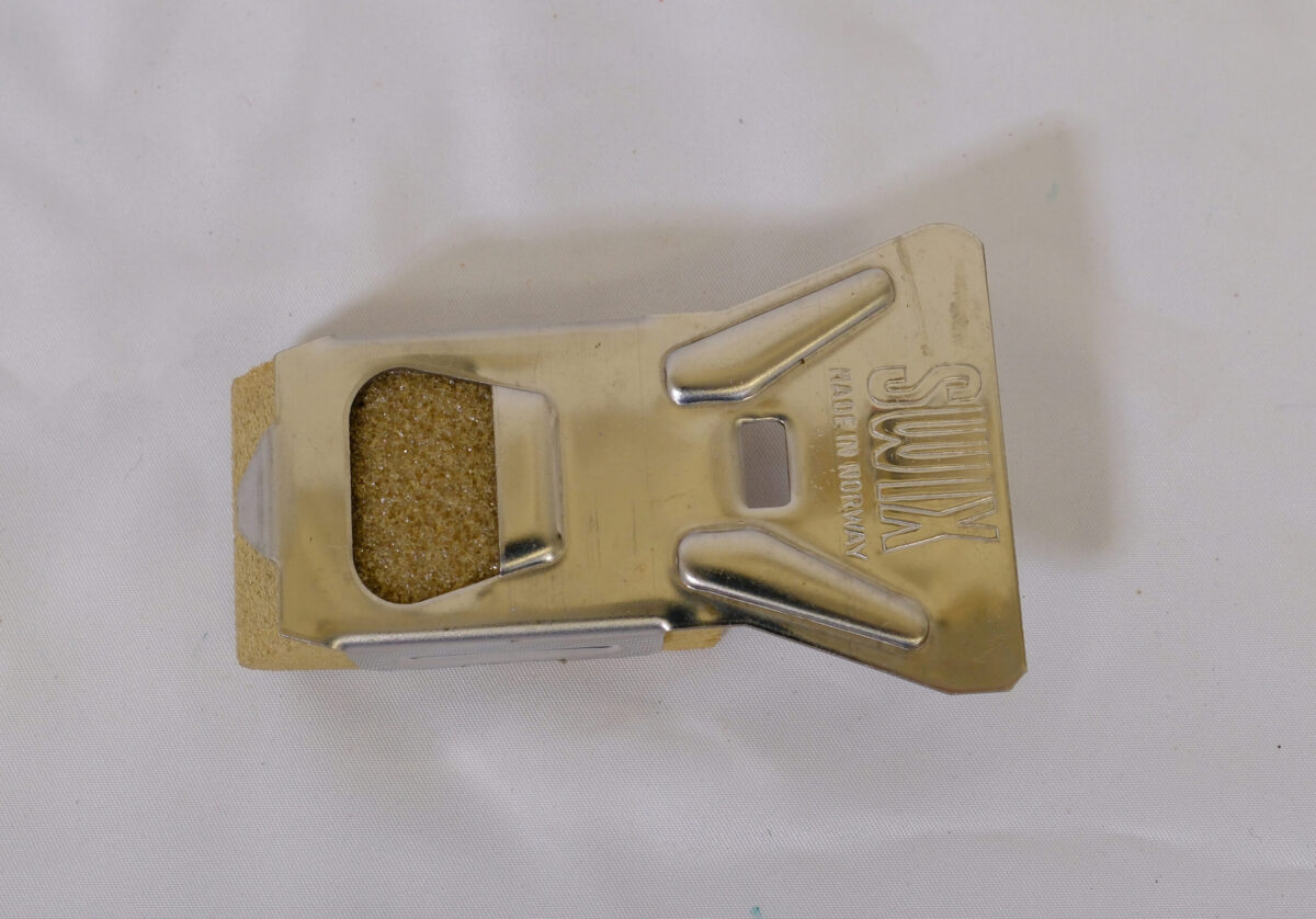Ski wax scraper issue to the British Army in cold climates