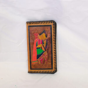 Small brown leather purse with coloured figure playing a harp on the front