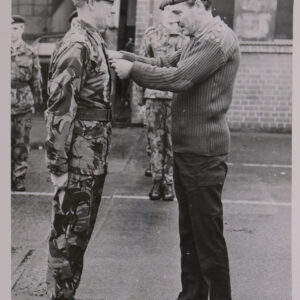 Captain David Greenfield being presented his medal by Brigadier Dick Gerald-Wright in Northern Ireland
