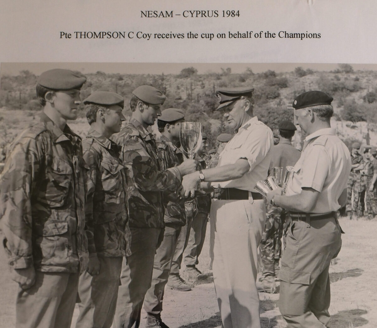 Private Thompson C Company receives the cup on behalf of the Champions Private Thompson C Company receives the cup on behalf of the Champions