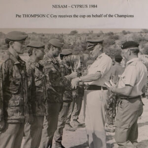 Private Thompson C Company receives the cup on behalf of the Champions Private Thompson C Company receives the cup on behalf of the Champions