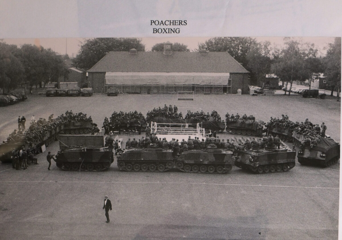 Boxing Ring surrounded by the battalion and military vehicles Boxing Ring surrounded by the battalion and military vehicles