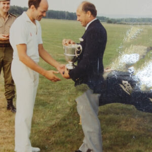 Brigadier Colin Groves presents a prize for a cricket match