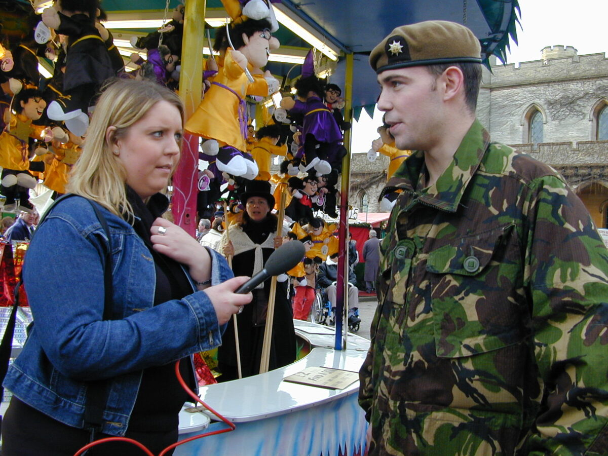 Drummers being interviews by a local reporter. Drummers being interviews by a local reporter.
