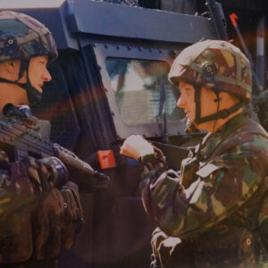 Sgt Ellie briefs Major Burrell OC A Company at the RUC Springfield Road.