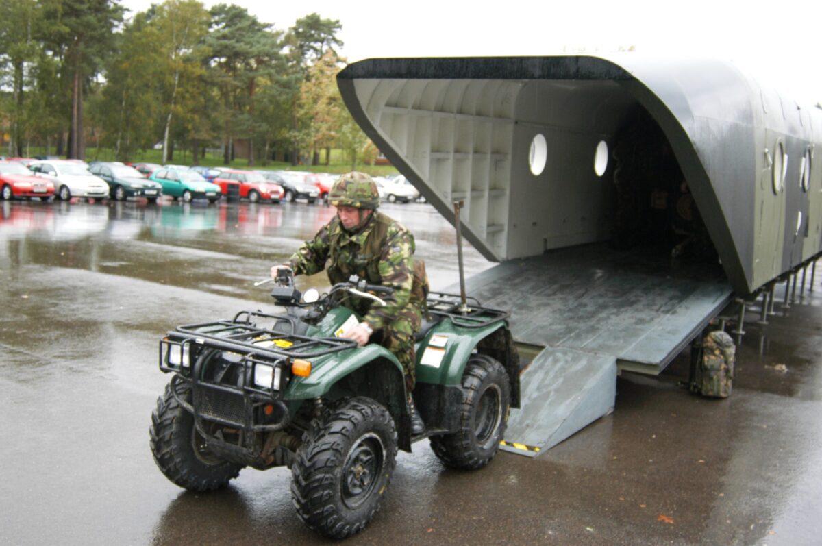 Wo2 Freeman diving a quad bike off a Chinook 47 during OPTAG training. Wo2 Freeman diving a quad bike off a Chinook 47 during OPTAG training.
