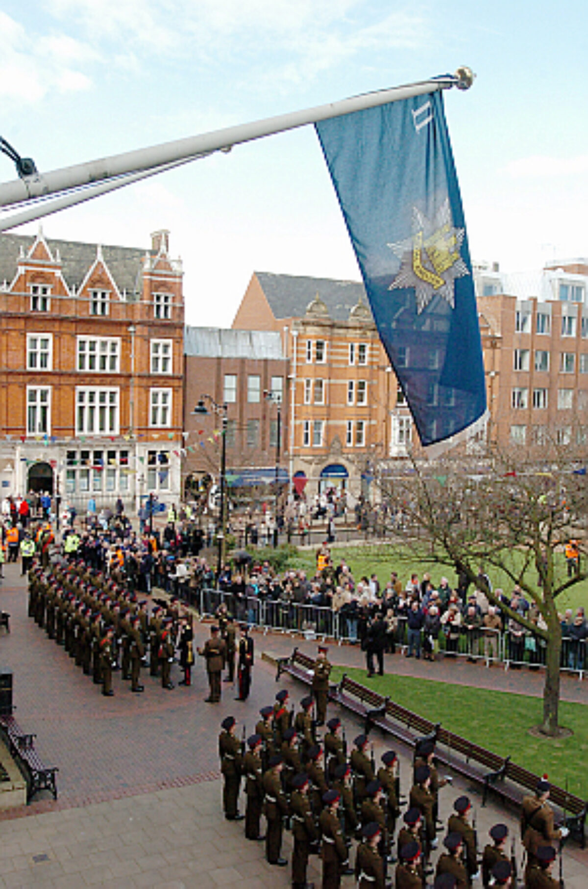 Soldiers from the 2nd Battalion Royal Anglian Regiment march through Leicester city centre. The scene in Town Hall Square