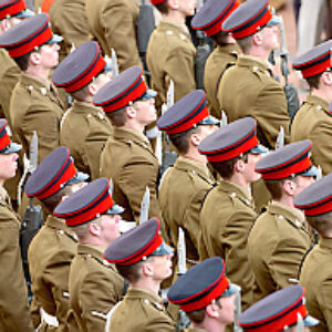Royal Anglian March : Soldiers from the 2nd Battalion Royal Anglian Regiment march through Leicester city centre. The scene in Town Hall Square. Pictured are the troops being inspected by Lord Mayor Paul Westley with Lieutenant General John McColl.