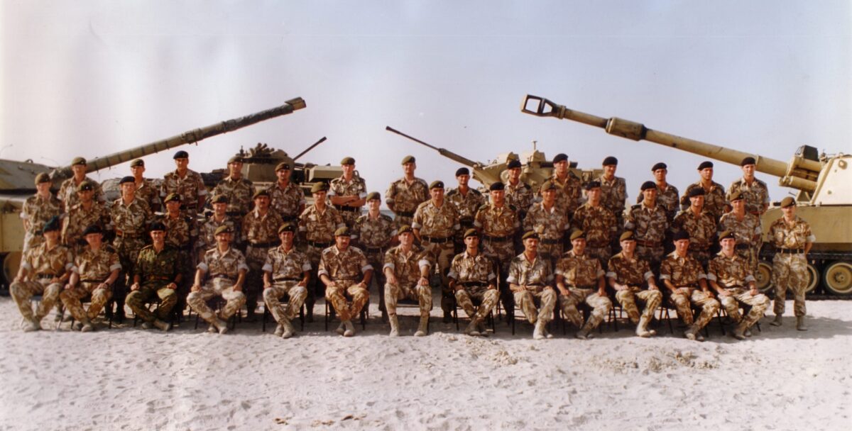 2nd Battalion Officers in the Gulf, 1991, The 2nd Battalion, nicknamed the Poachers, was deployed to Kuwait as part of the British Force in the Gulf. The photograph shows officers from the Poachers with colleagues from their All Arms Battlegroup. Vehicles from the Infantry, Armoured Corps and Royal Artillery form the backdrop.