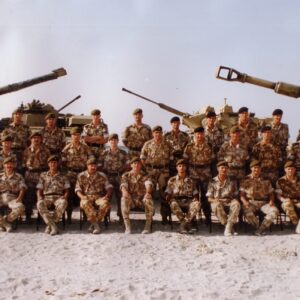 2nd Battalion Officers in the Gulf, 1991, The 2nd Battalion, nicknamed the Poachers, was deployed to Kuwait as part of the British Force in the Gulf. The photograph shows officers from the Poachers with colleagues from their All Arms Battlegroup. Vehicles from the Infantry, Armoured Corps and Royal Artillery form the backdrop.