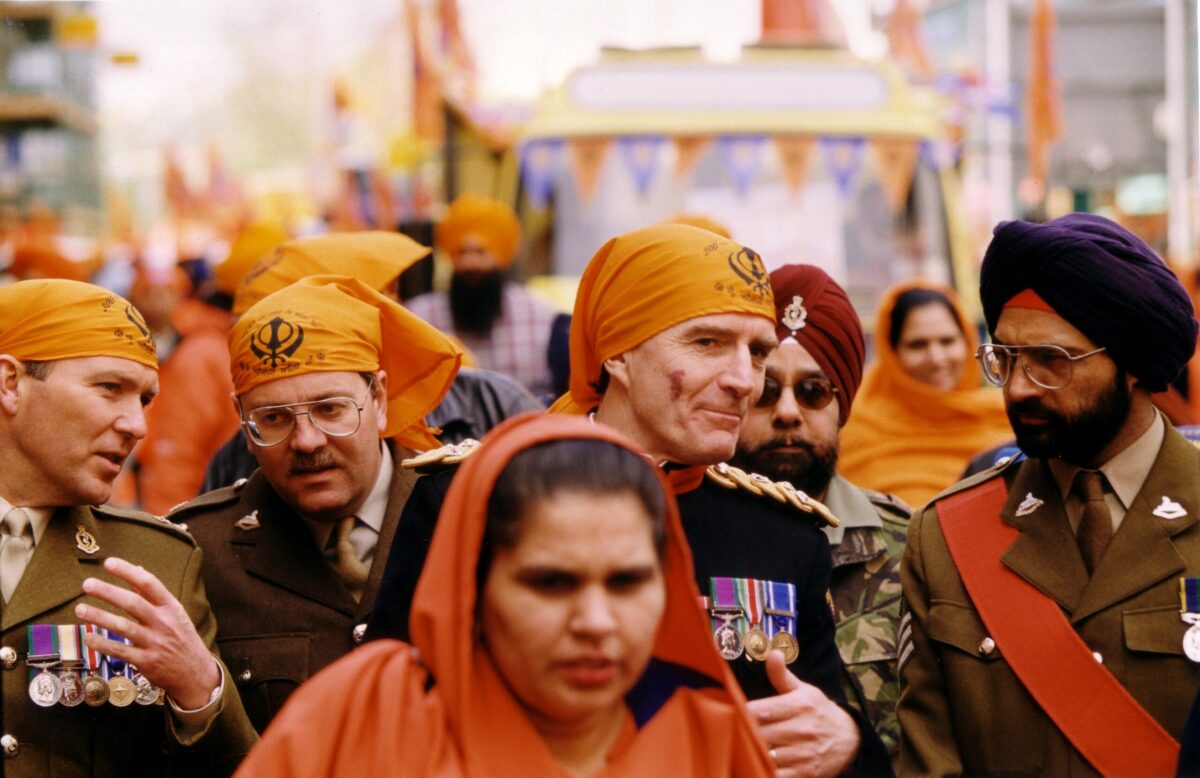 Major General J C McColl CBE & Sergeant Nagra MBE, Vaisakhi parade, Leicester, 1999 This parade was part of an army initiative to strengthen relationships with ethnic minorities in Leicester.