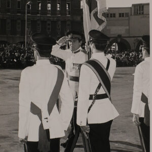 Brig Ngel H Birbeck. the Deputy Fortress Commander in Gibraltar, salutes the Regimental Colour