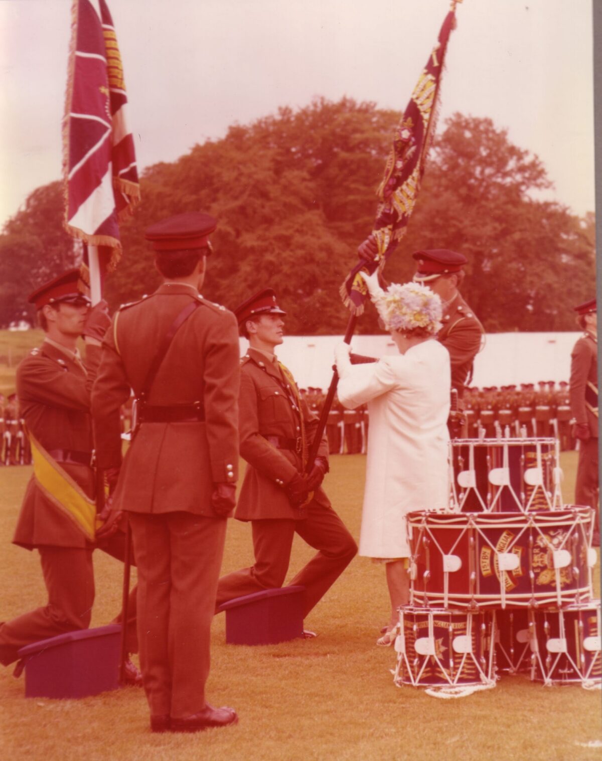 On 12 July 1974, Queen Elizabeth The Queen Mother presented new Colours to the 1st, 2nd, 3rd, and 5th (Volunteer) Battalions of the Royal Anglian Regiment at Tidworth Garrison. On 12 July 1974, Queen Elizabeth The Queen Mother presented new Colours to the 1st, 2nd, 3rd, and 5th (Volunteer) Battalions of the Royal Anglian Regiment at Tidworth Garrison.