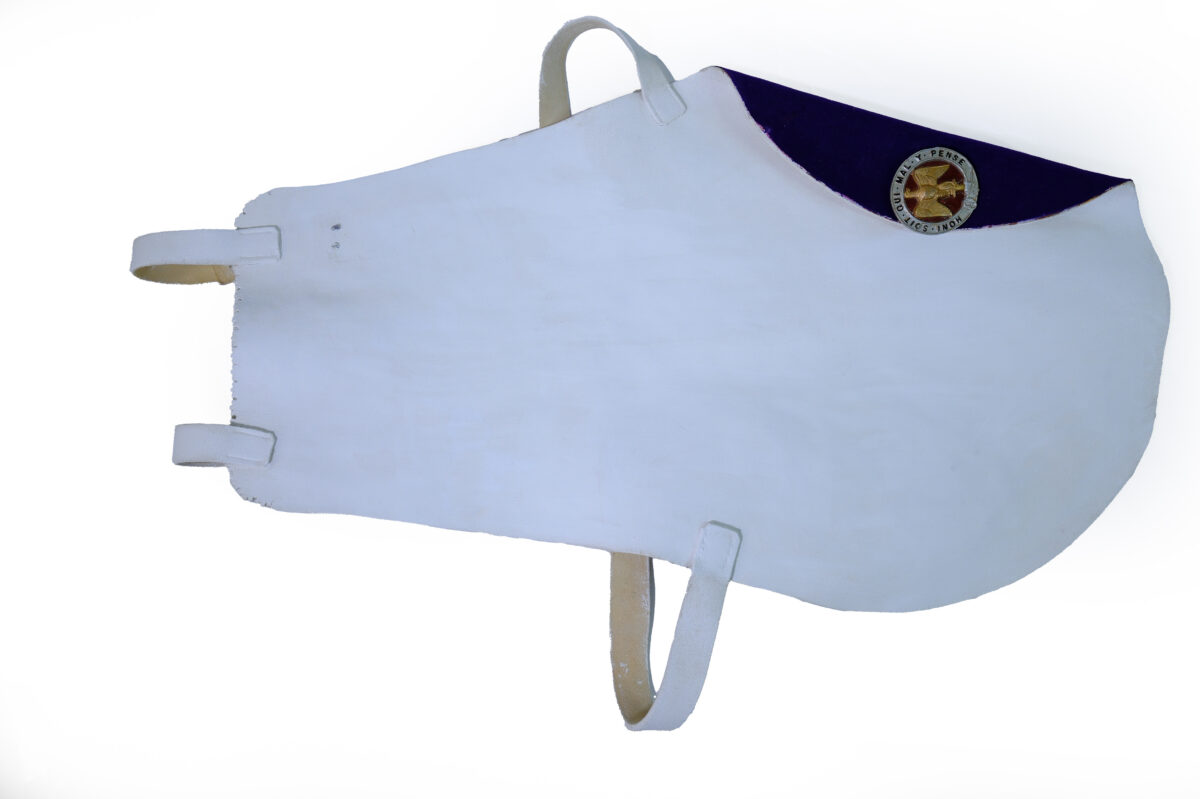 drummer's leg protector is designed to protect marching band uniforms from wear.