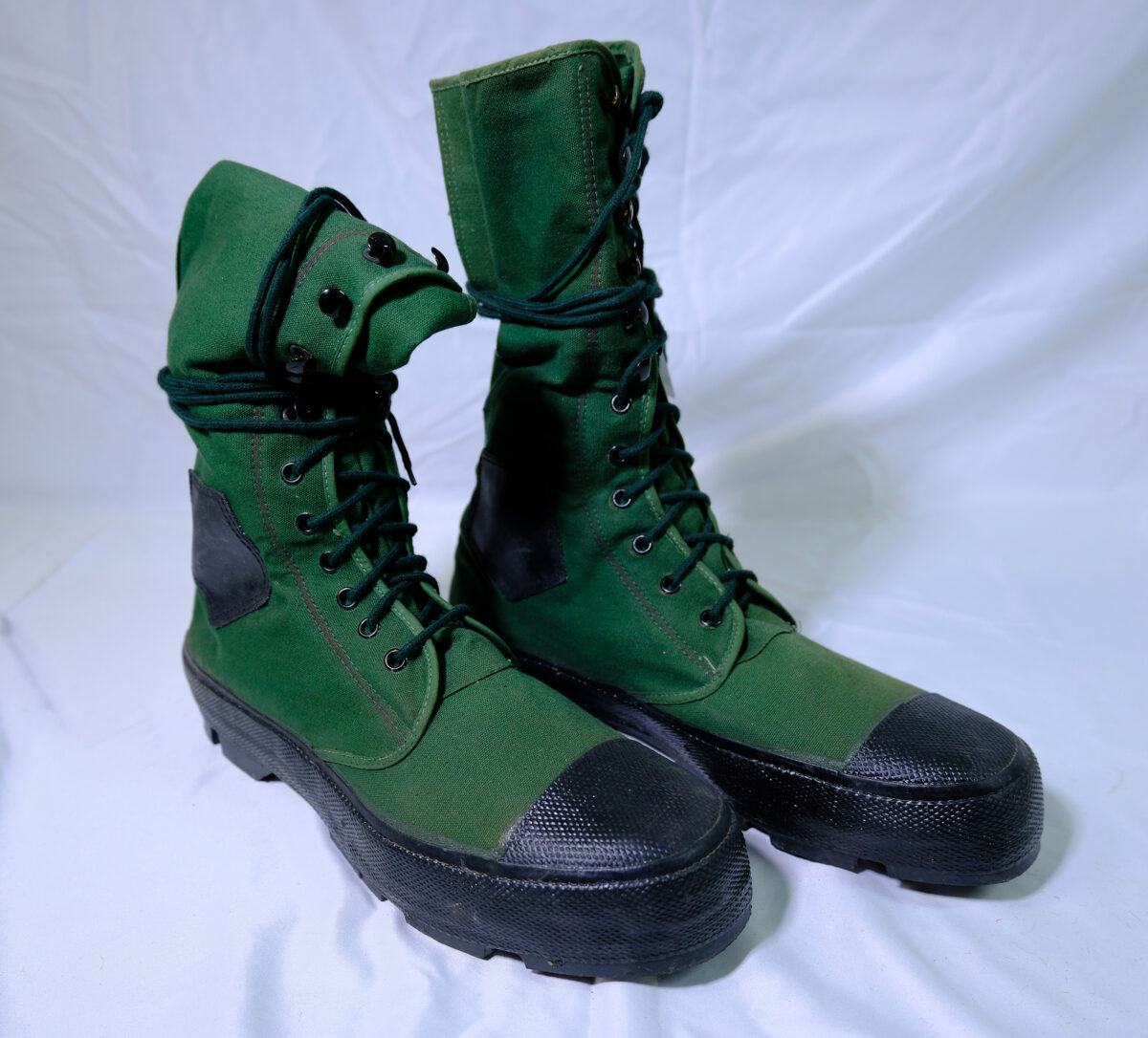 British Army 1944/1950s pattern green canvas jungle boots with black rubber toe caps and soles British Army 1944/1950s pattern green canvas jungle boots with black rubber toe caps and soles